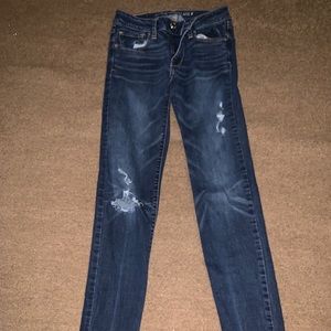 ripped dark wash super stretch skinny jeans